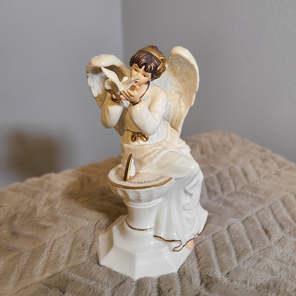 Ivory Ceramic Angel Figurine with Gold Accents